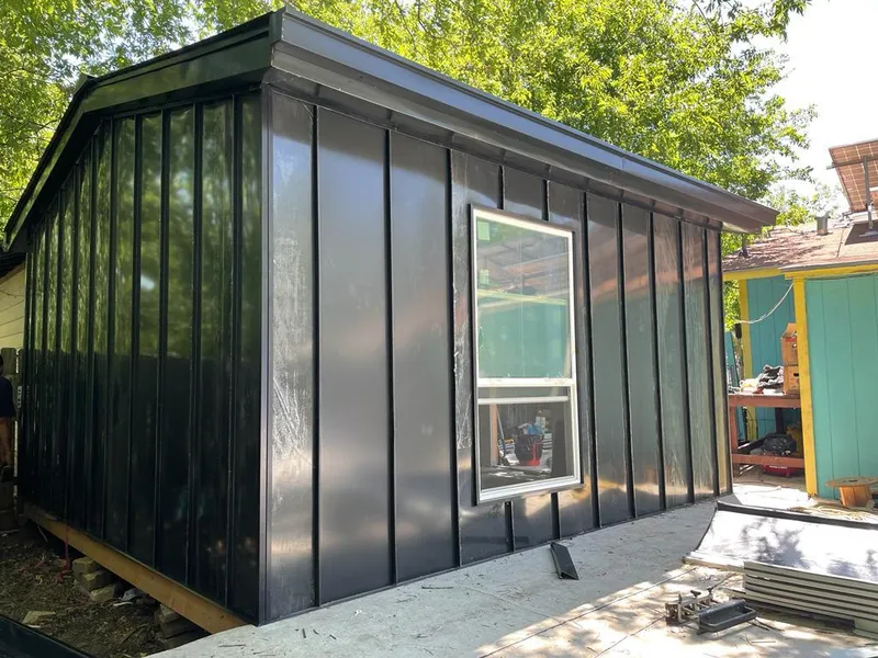 Black standing seam metal wall panels for Roof Inspection in Chartiers